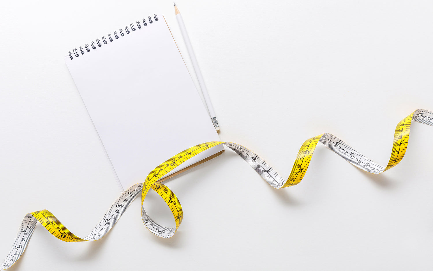 How To Measure Compression Stockings: Main Image Showing Measuring Tape - A Pen - And A Paper