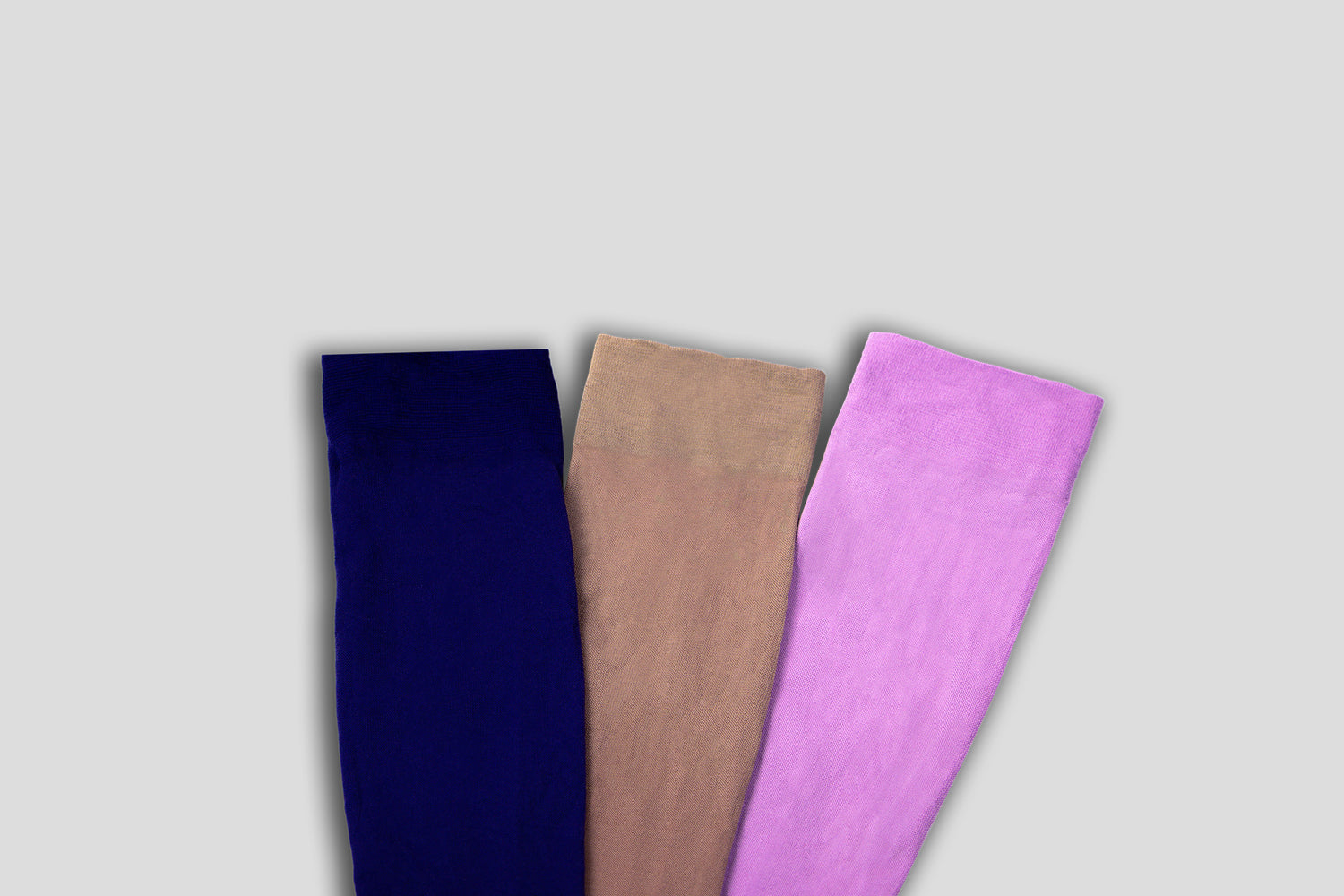 Close Look To Compression Stockings Fabric Presented in 3 Colors - Light Grey Background